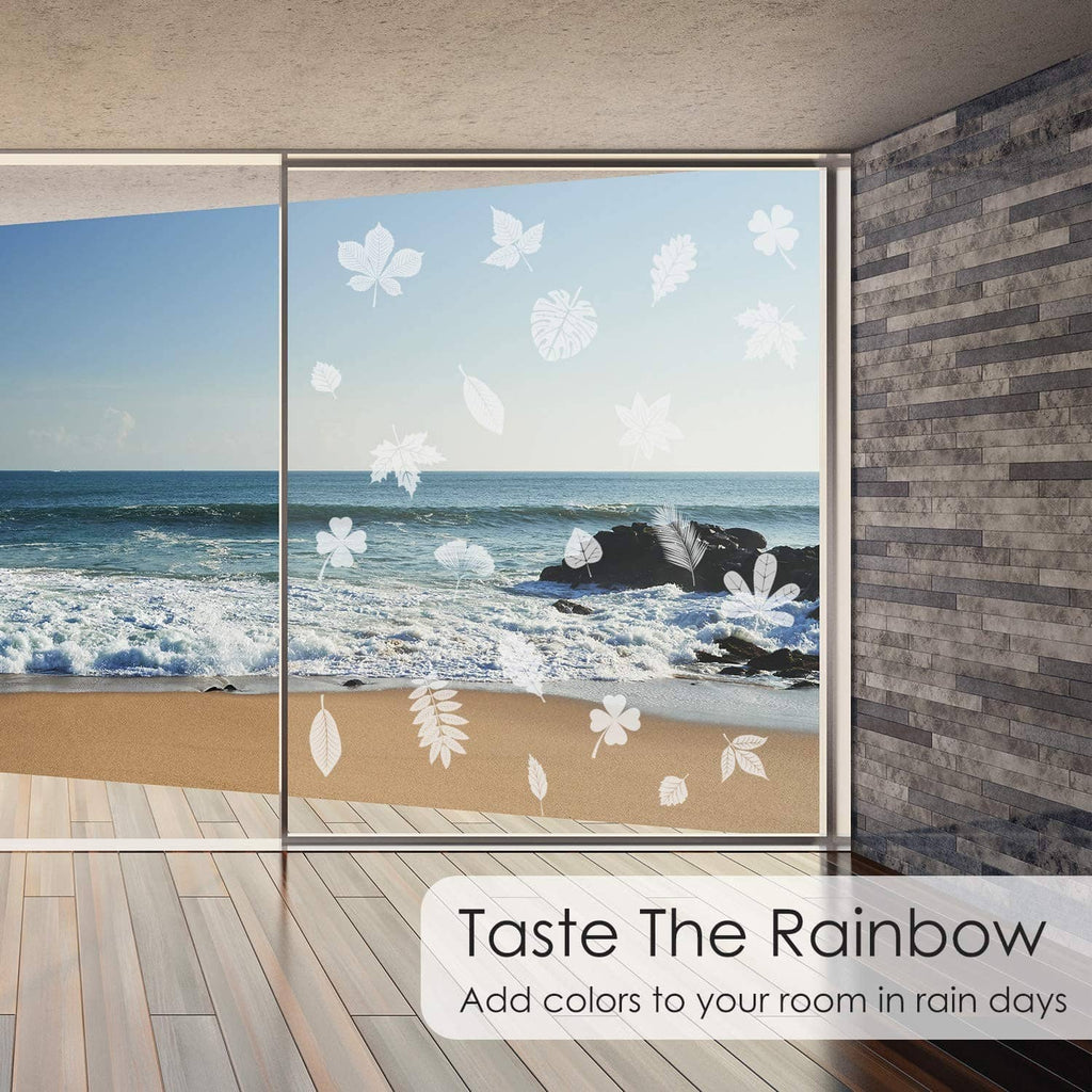 Leaf window cling stickers, white leaf shapes across window glass