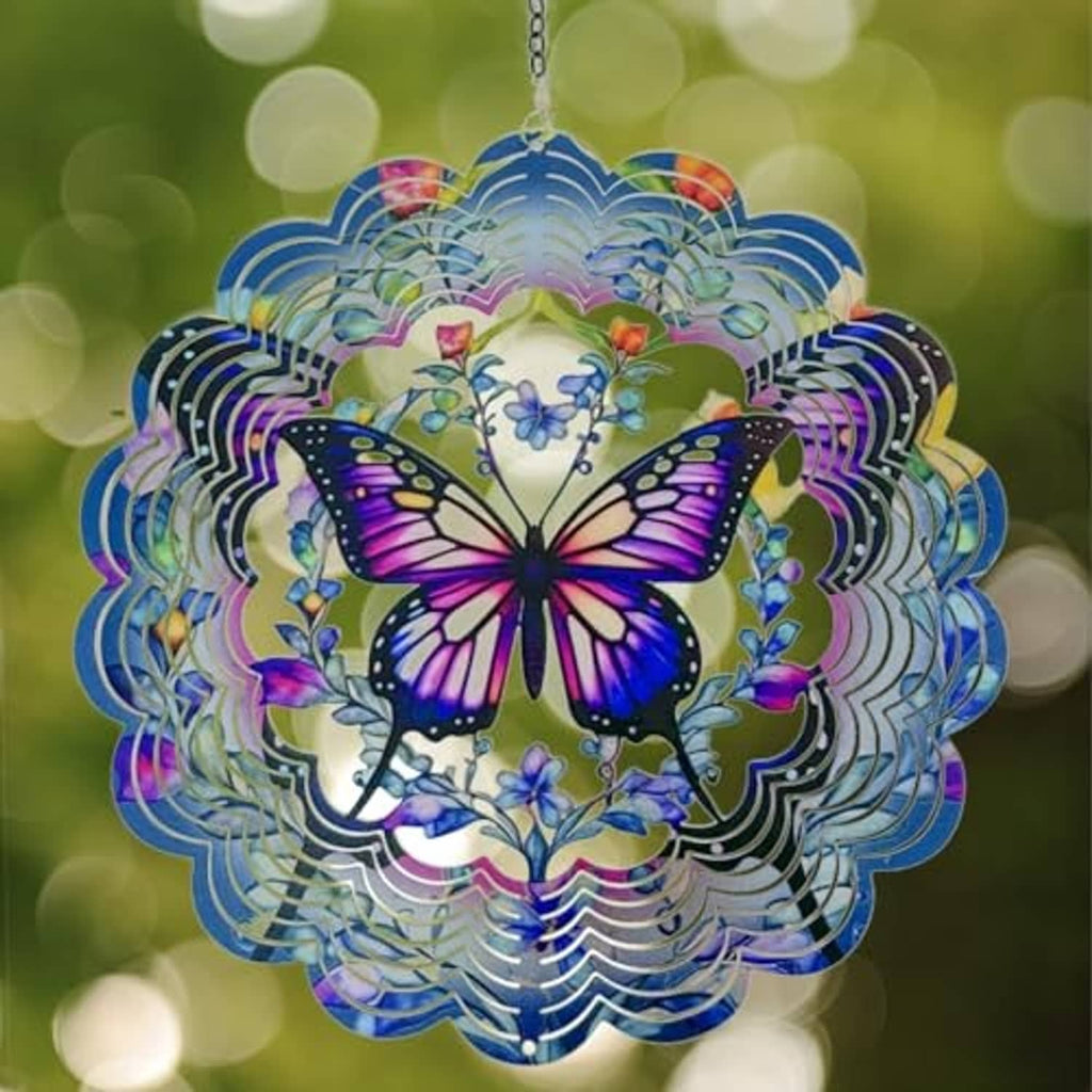 Butterfly wind spinner with purple wings and blue/teal concentric metal circle layers