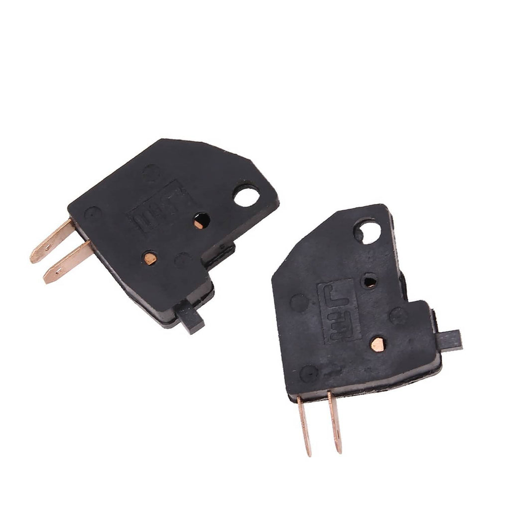 Brake light stop switch with black housing and two spade terminals, metal contacts visible