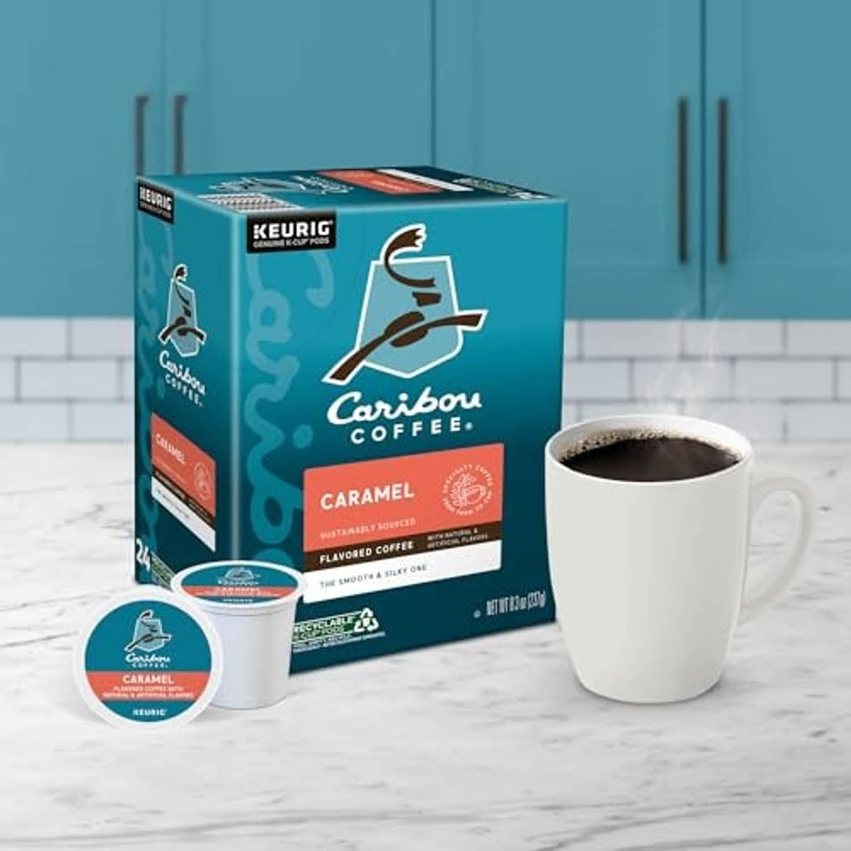 Caramel flavored K-Cup coffee box with brewed cup and small coffee pod