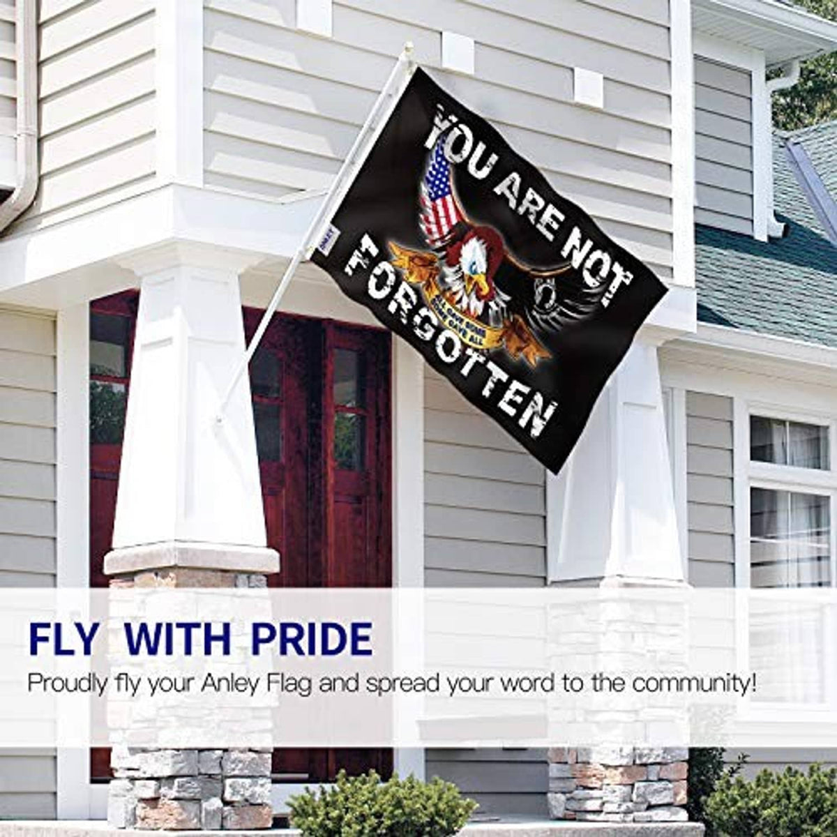 Black POW/MIA flag hanging outside with eagle and “You are not forgotten” text