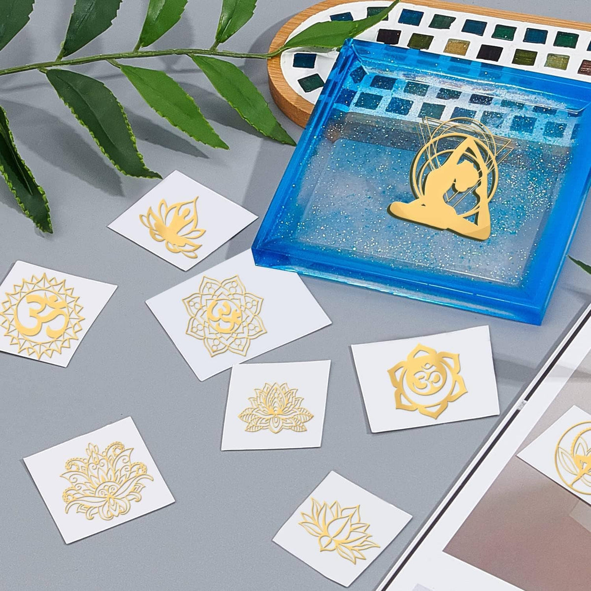 Gold chakra yoga stickers on cards, featuring lotus, Om, and mandala symbols