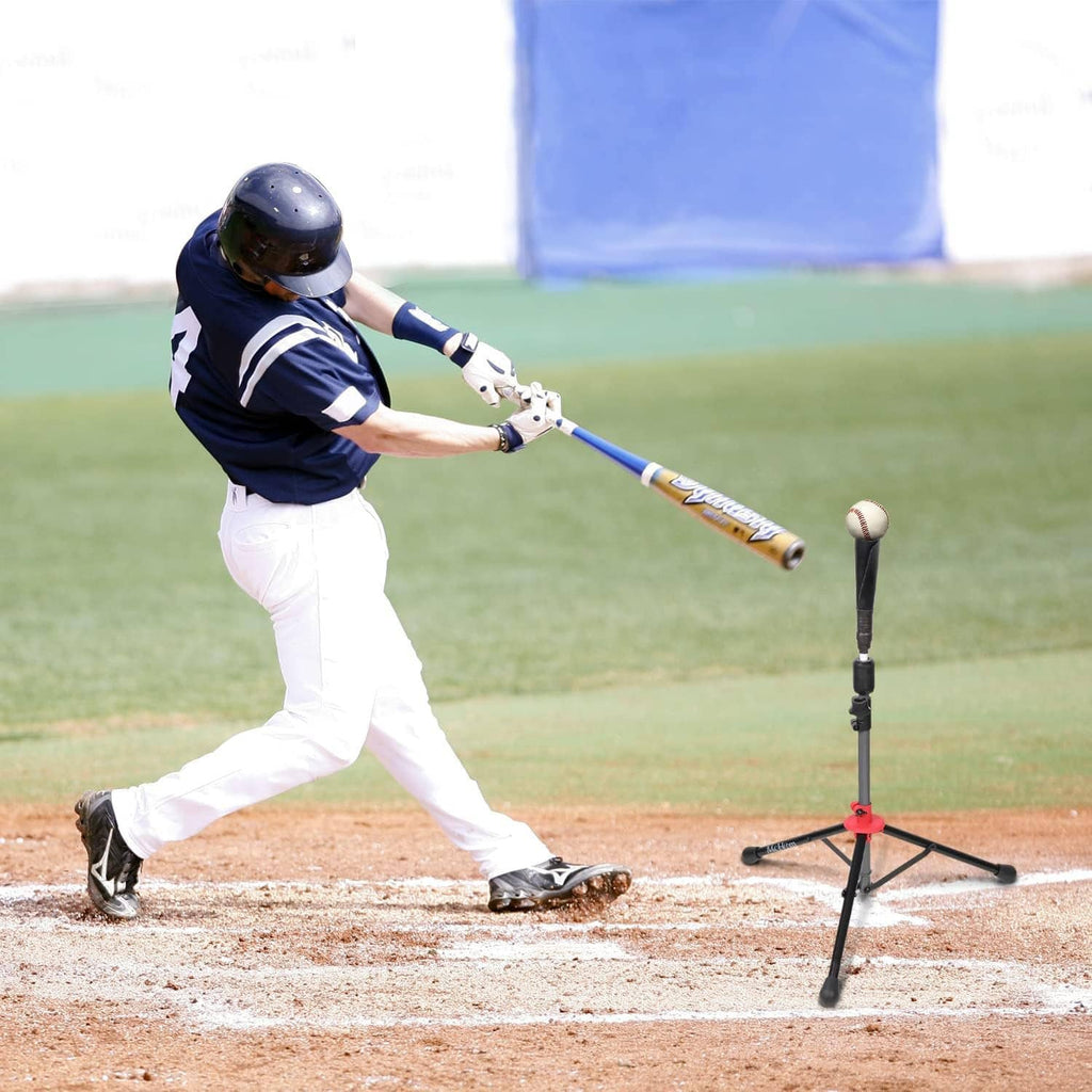 Portable batting tee with red base and black tripod, set beside a baseball player