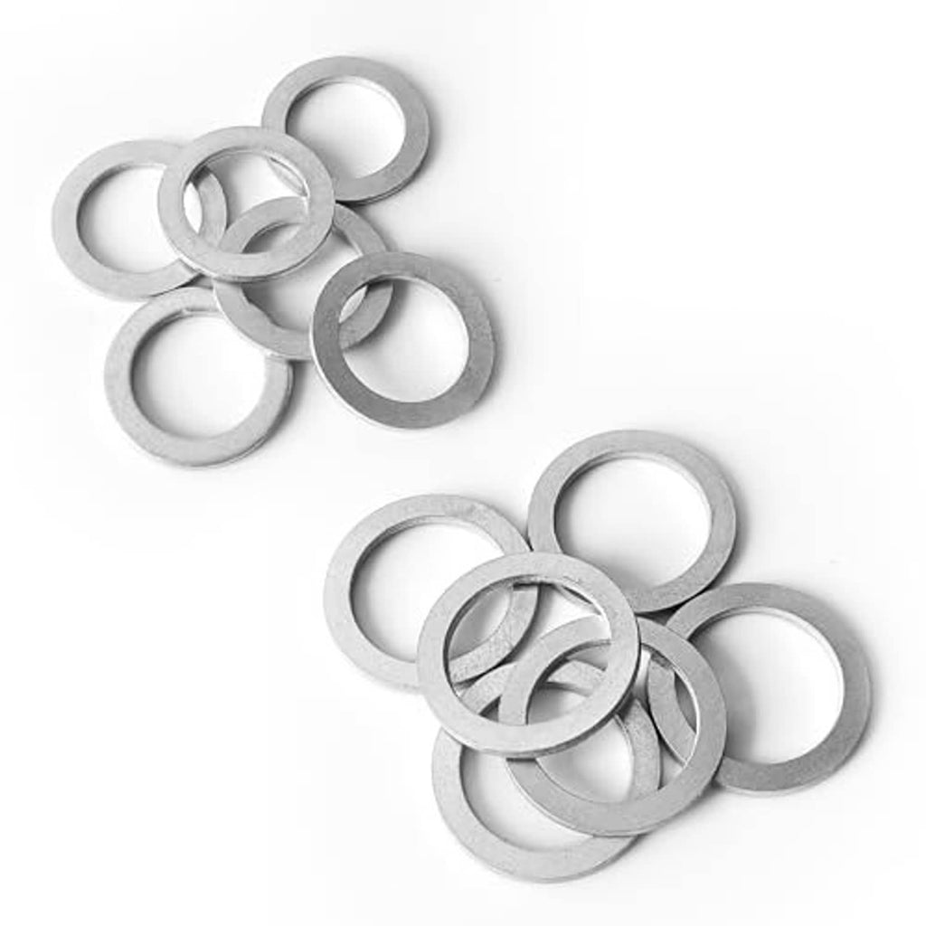Eight shown drain plug washers with circular openings, silver metal sealing rings