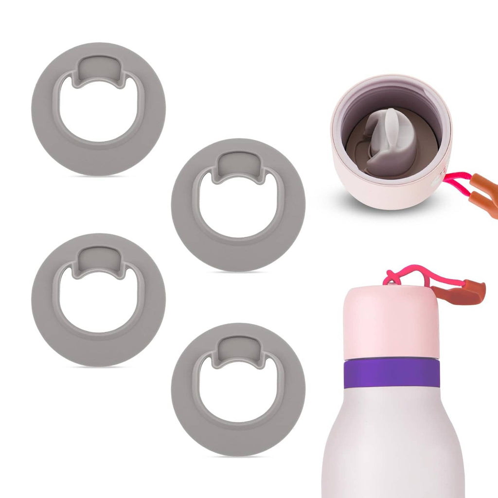 Four gray water bottle stoppers and one installed stopper on a pink bottle top