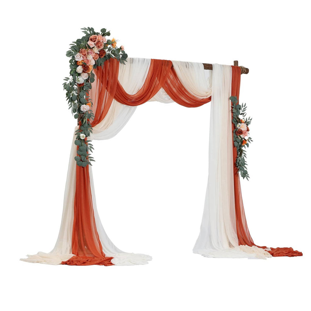 Artificial wedding arch floral kit with orange and white draped curtains and garlands