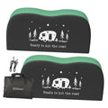 Black and green dual-axle RV tire cover with camper/star graphic; includes storage bag