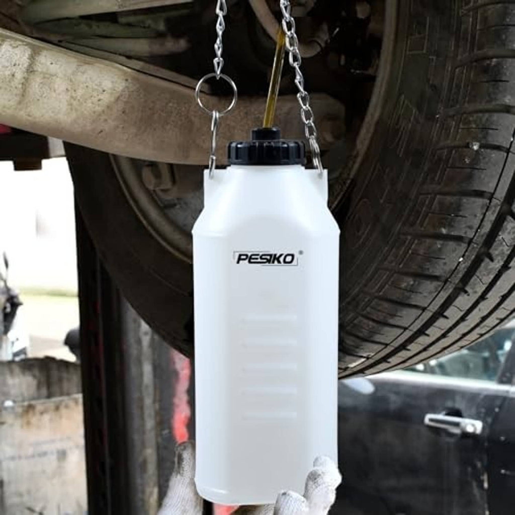 Brake bleeder bottle suspended by chain under a vehicle wheel area