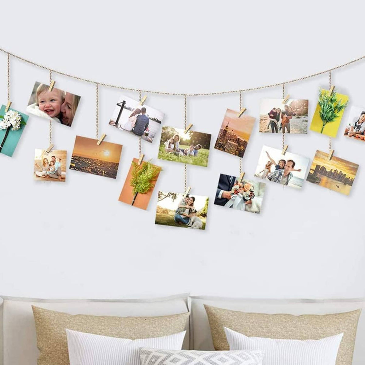 Wooden mini photo clothes pins hanging framed pictures on a garland