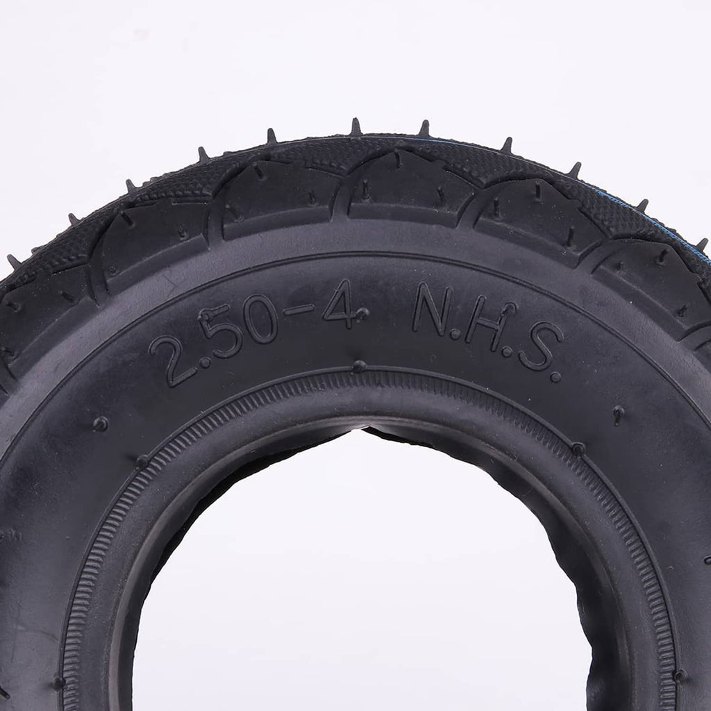 Black tire sidewall close-up with 2.50-4 N.H.S marking and tread nubs