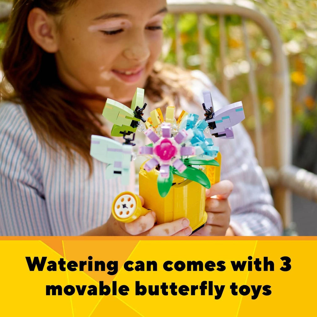 LEGO Creator yellow watering can with purple, teal and green flower and butterfly toys