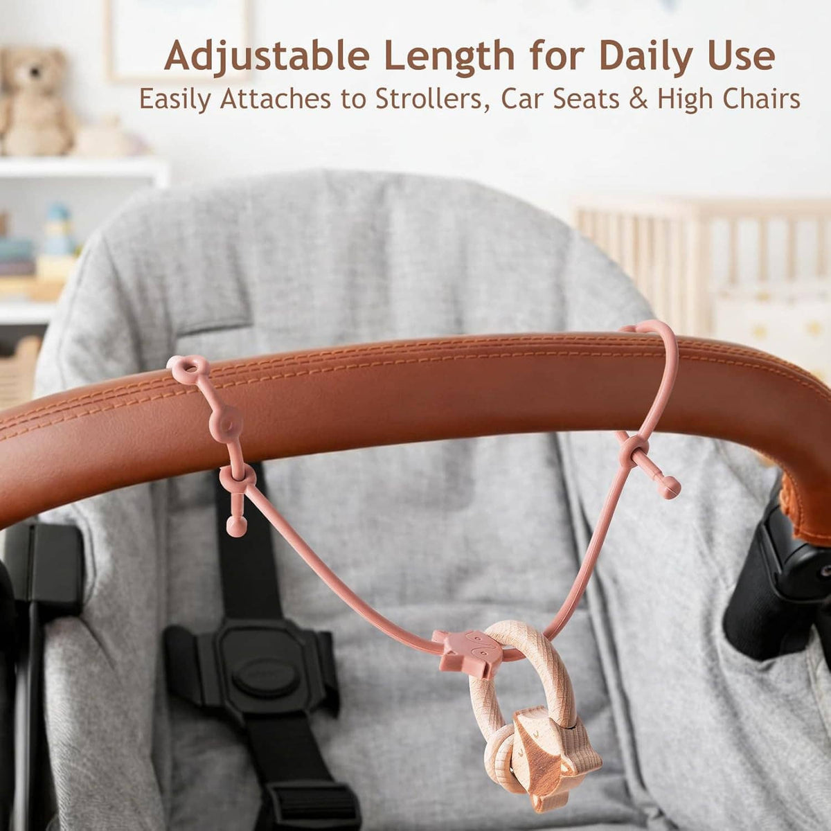 Adjustable silicone toy strap with brown bar and hanging animal teether charms