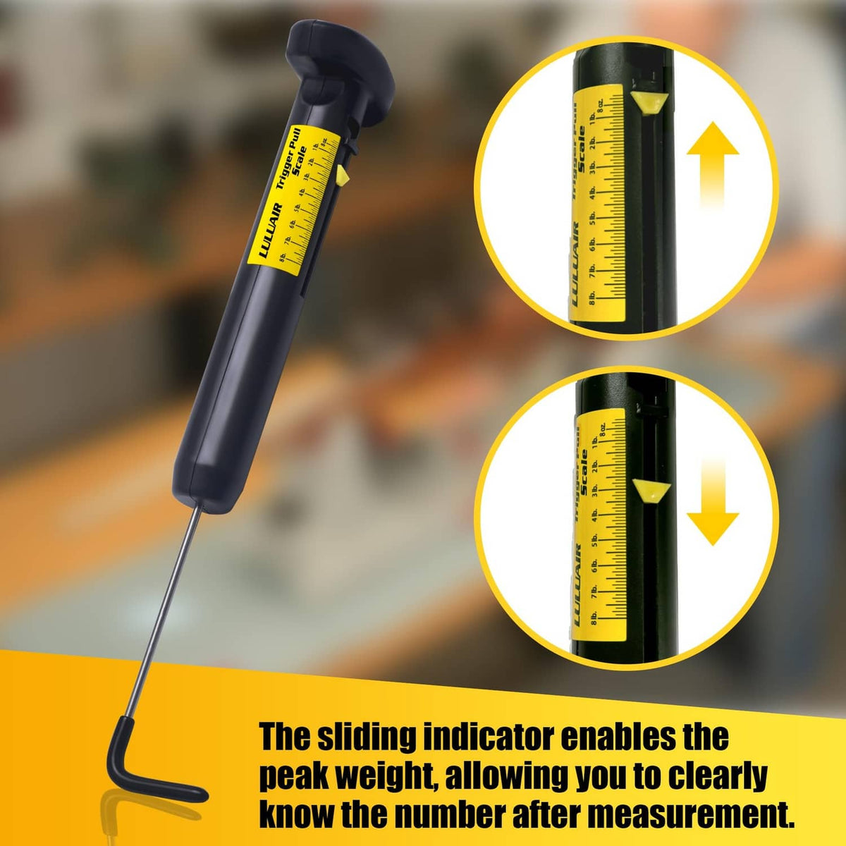 Black pull scale with yellow measurement label and sliding indicator gauge on rod