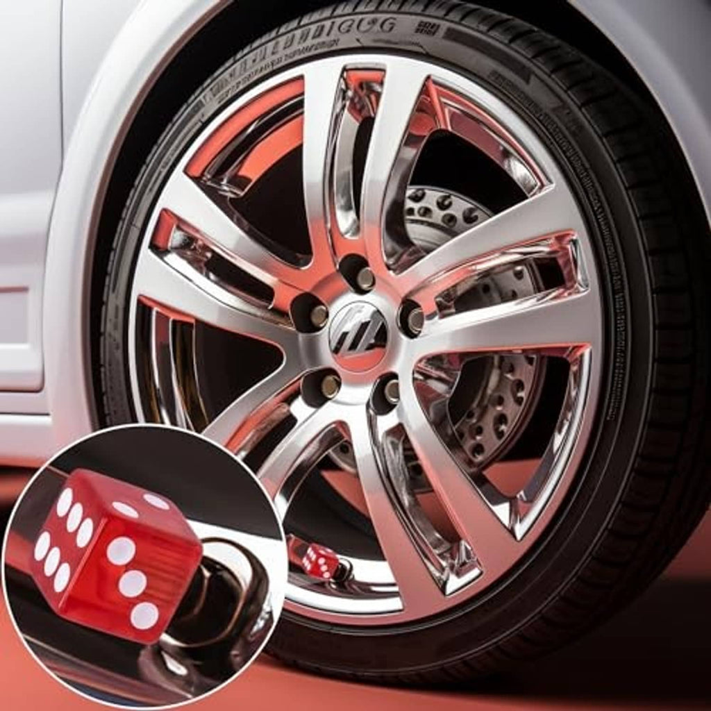 Red dice valve stem cap on a chrome wheel with white dot pattern
