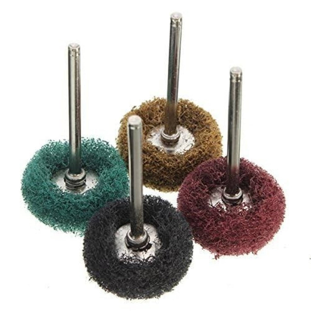 Abrasive buffing wheel heads on metal mandrels in teal, tan, maroon, and black.