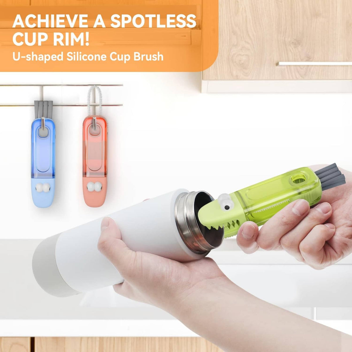 Green cup rim cleaning brush with U-shaped head held in hand