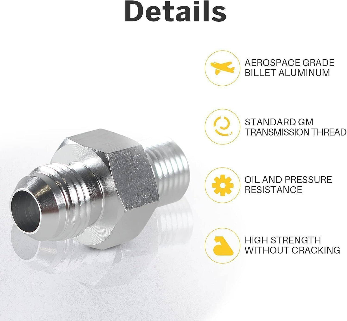 Close-up of aluminum transmission fitting with hex body and flare-style threaded ends.