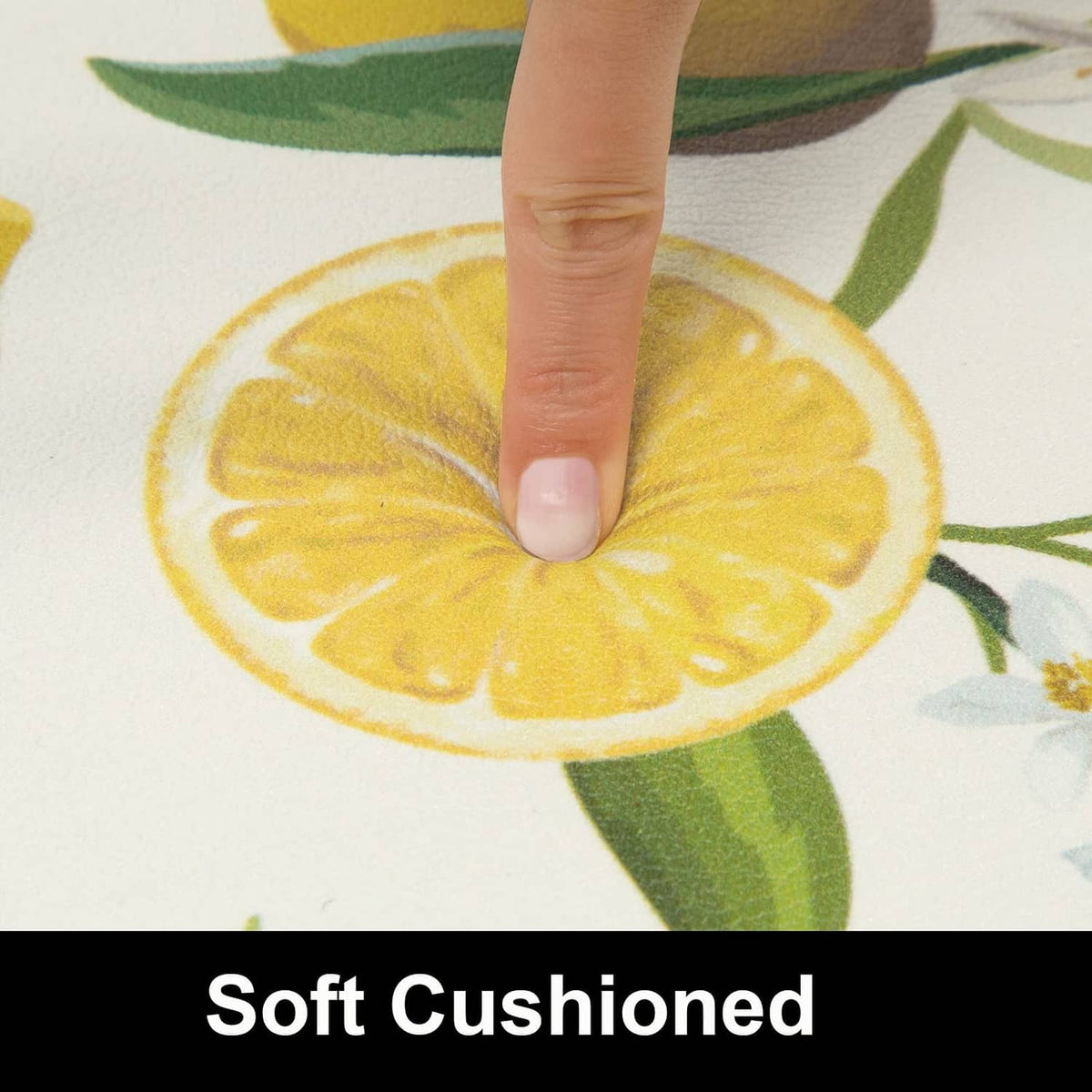 Close-up of a white lemon-print rug surface, softly indented for cushioned support