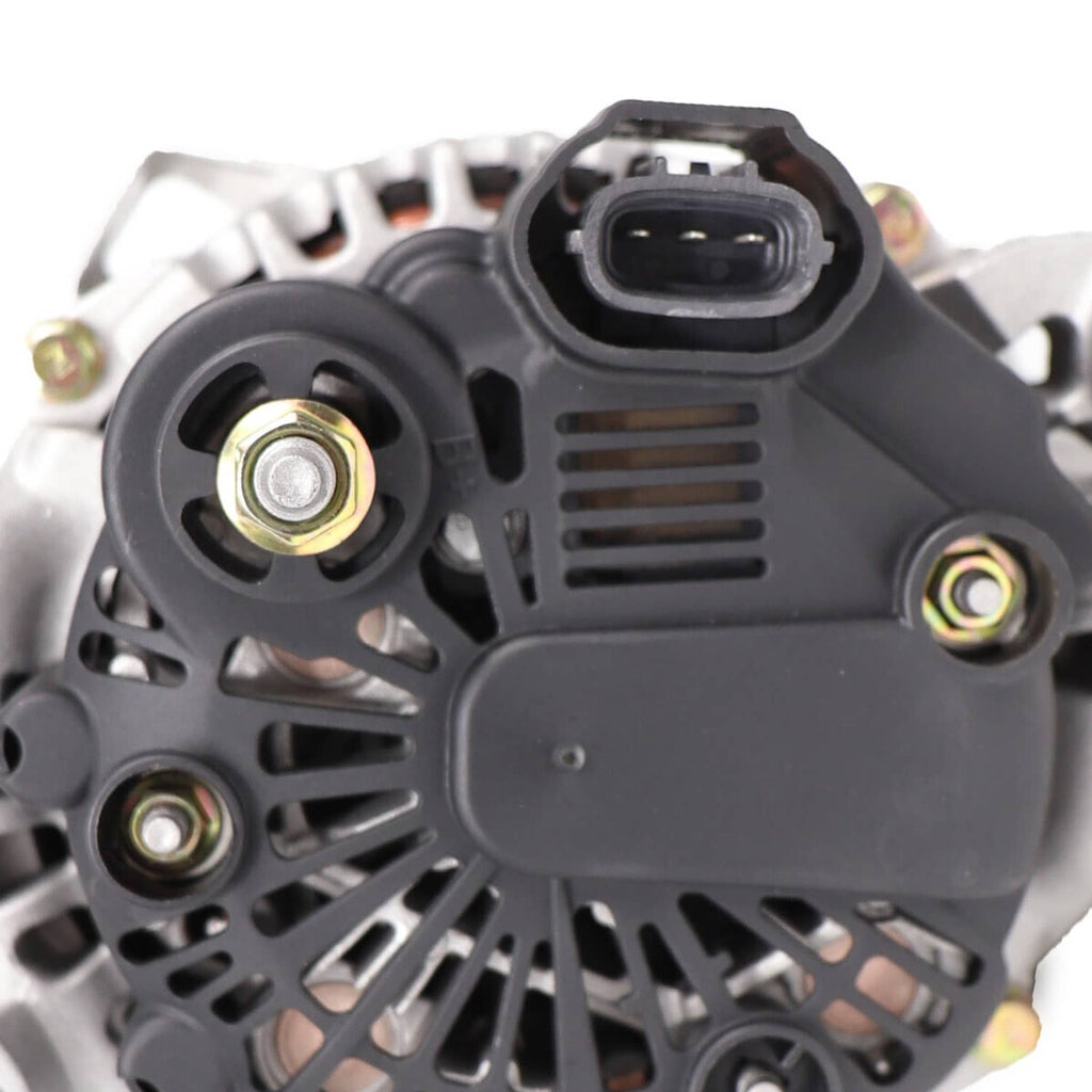 Close-up of alternator rear with black connector socket and mounting bolts on silver housing.