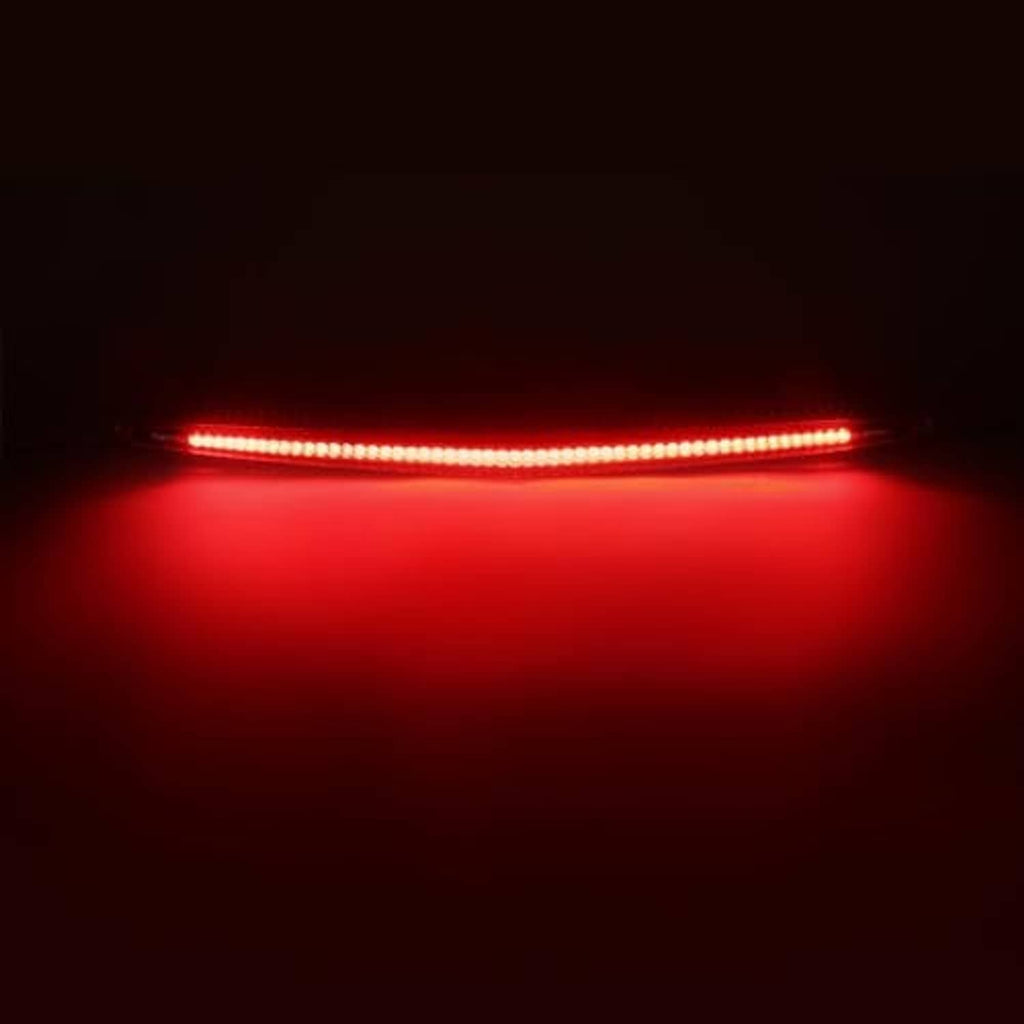 Rear LED third brake light bar lit red, long continuous light strip view.
