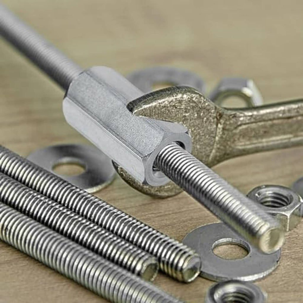 Stainless coupling nut clamped on threaded rod with hex exterior