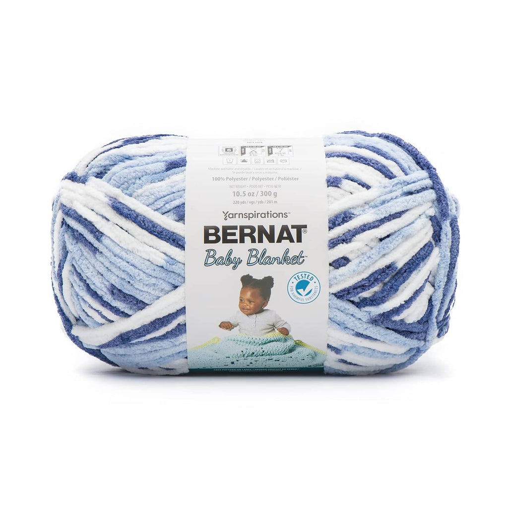 Blue variegated baby blanket yarn skein with Bernat Baby Blanket label