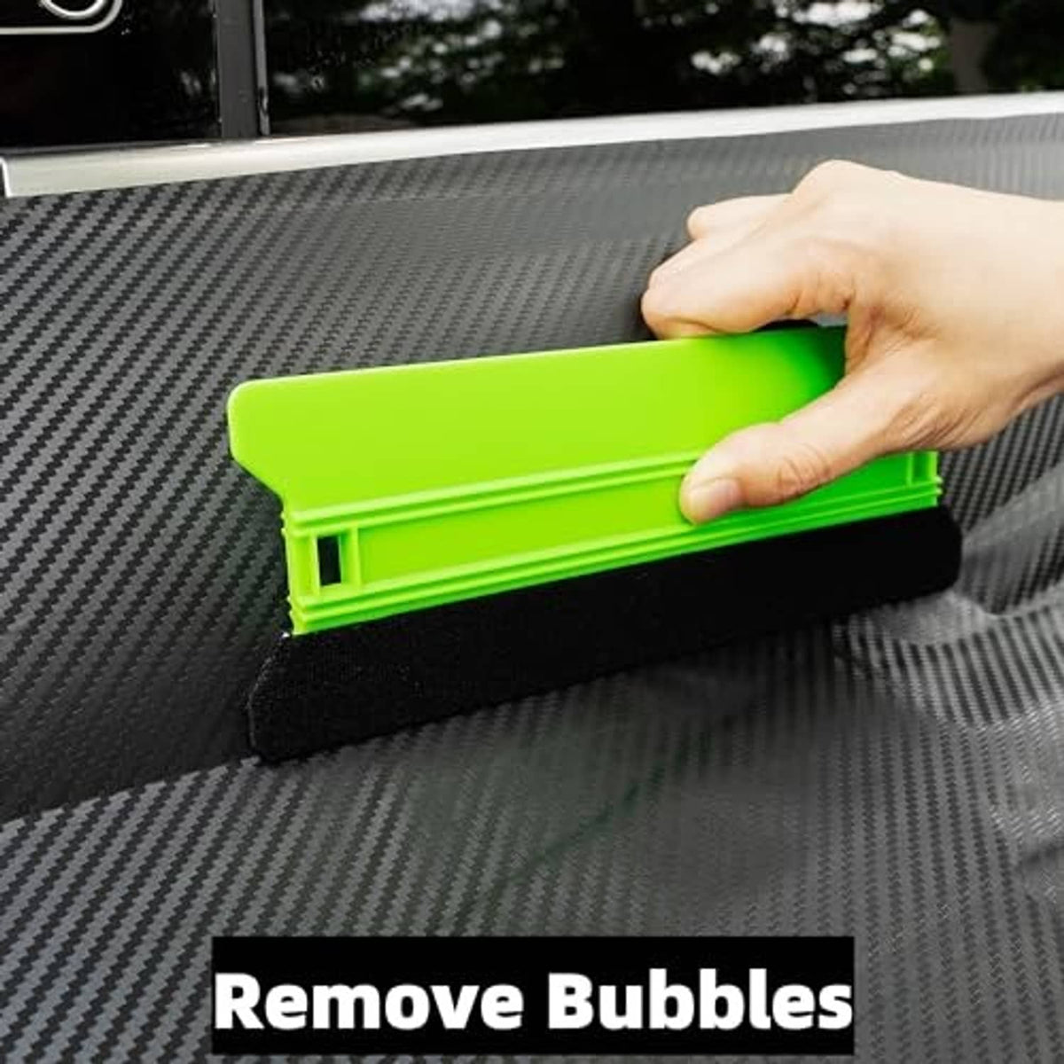 Hand holding felt edge squeegee with neon green handle and black pad