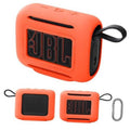 Orange silicone speaker case and extra accessory pieces with carabiner