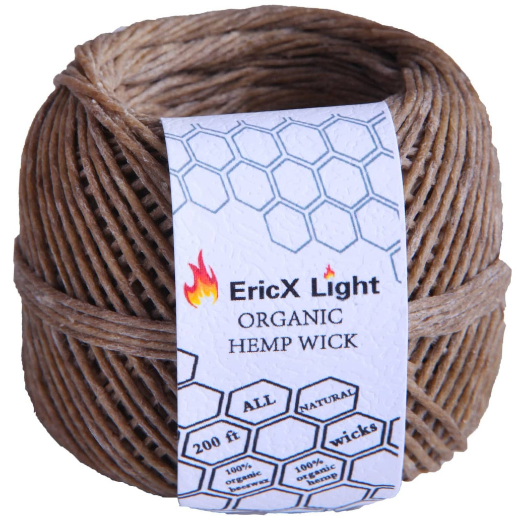 Organic hemp wick spool with label, brown coiled wick wrapped in tight loops