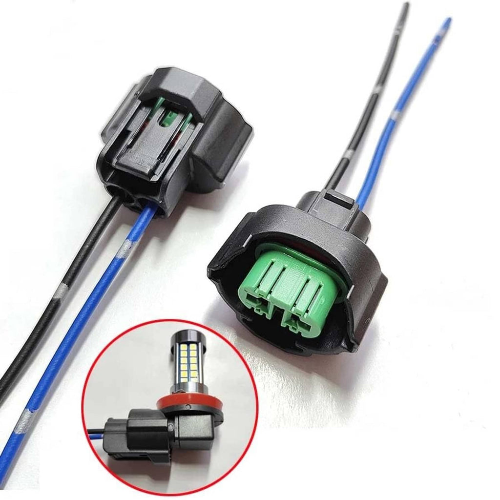 Headlight bulb adapter plugs with green terminals and blue/black wire leads