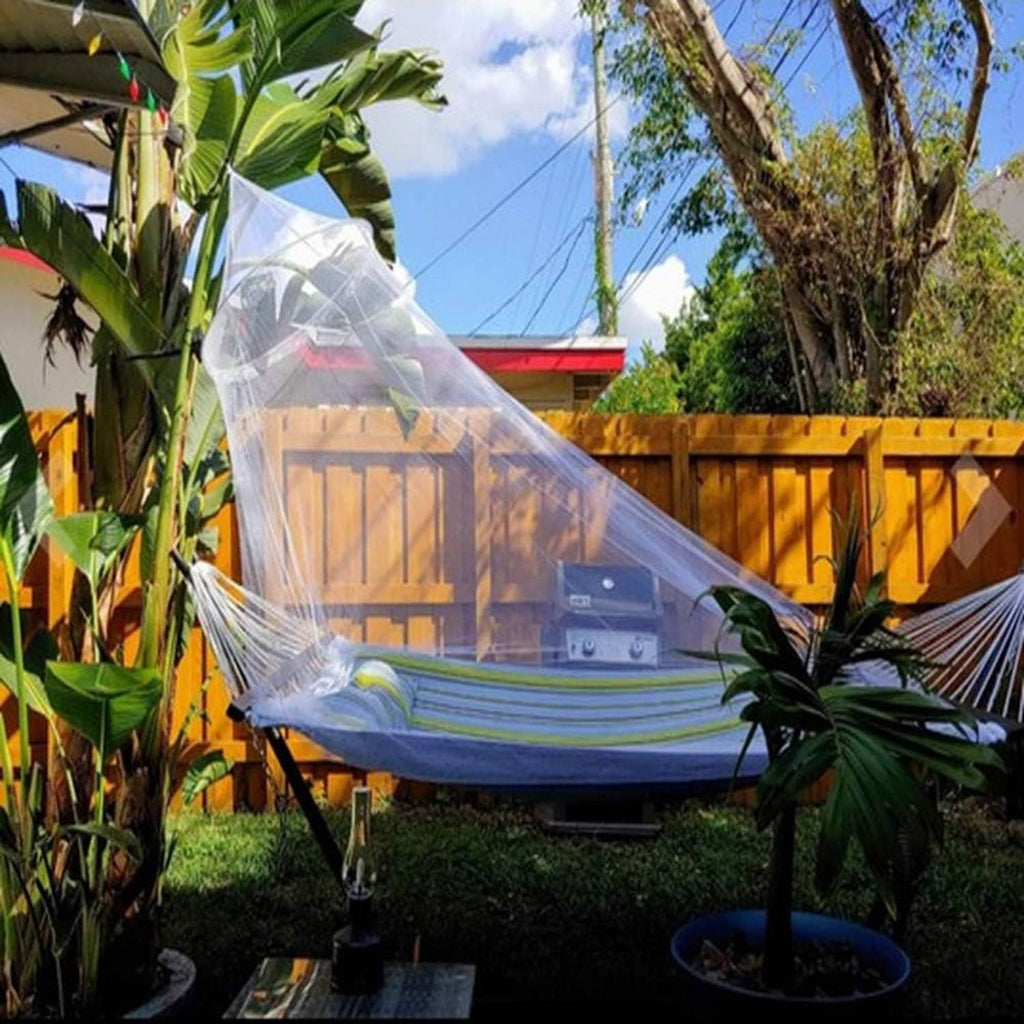 Clear mosquito net canopy draped over a hammock
