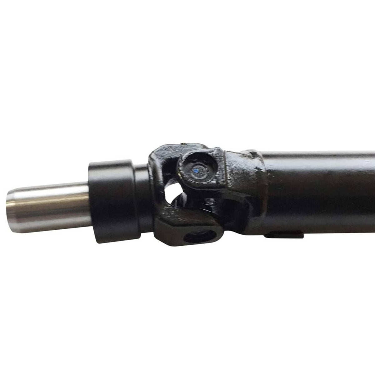 Rear prop shaft assembly close-up of U-joint yoke and connecting shaft end