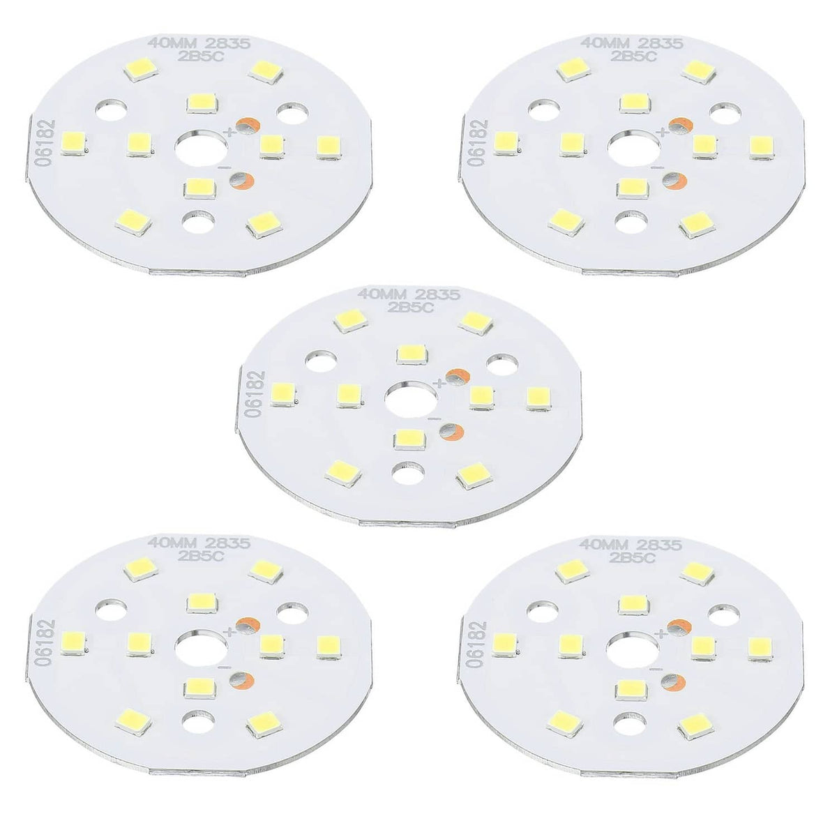 Round white LED chip board with multiple surface-mount LED squares and mounting holes