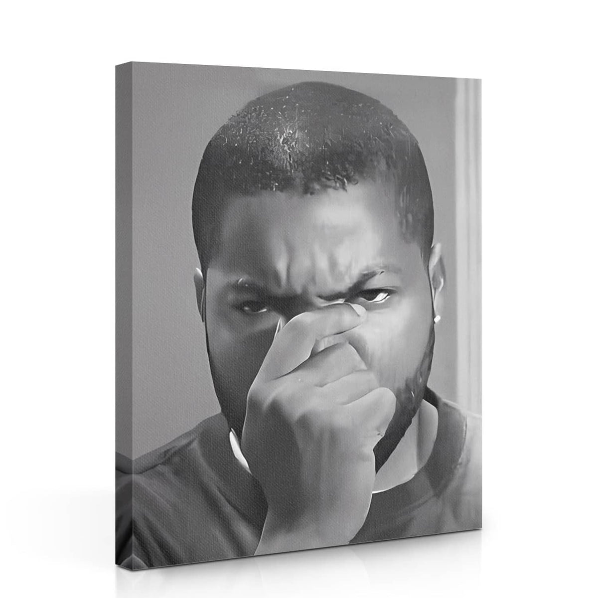 Black-and-white canvas wall art with portrait of man covering mouth, wrapped frame