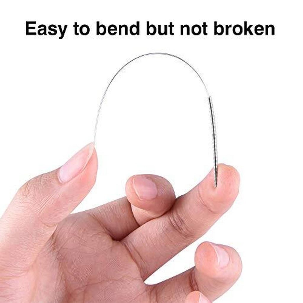 Flexible stainless cleaning needle, held in hand with pointed tip
