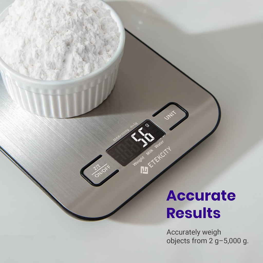 Digital kitchen scale top with LCD display and unit buttons, showing grams/ounces