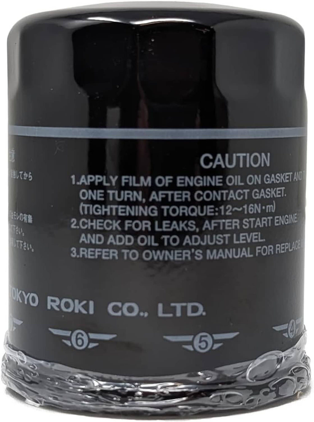 Black engine oil filter canister with caution text and Subaru logo on side.