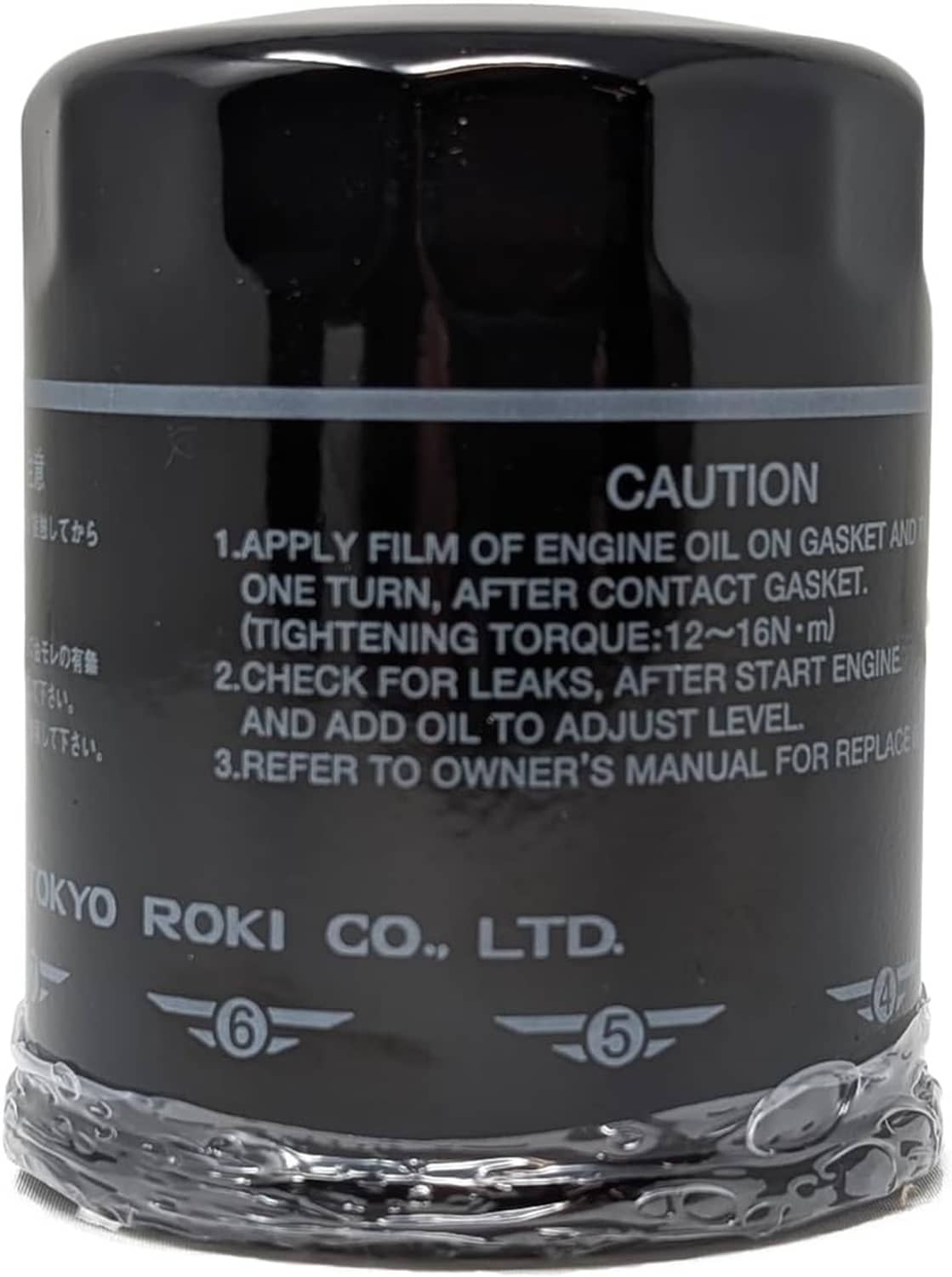 Black engine oil filter canister with caution text and Subaru logo on side.
