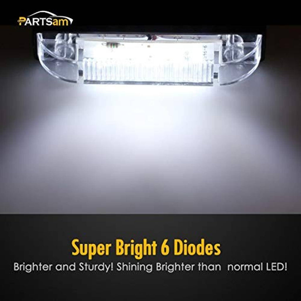 LED utility light bar shining through clear lens with side mounting brackets.