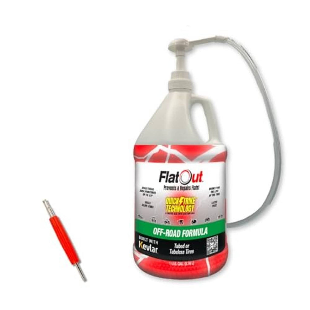 QuickStrike tire sealant jug with red/white label and clear dispensing hose