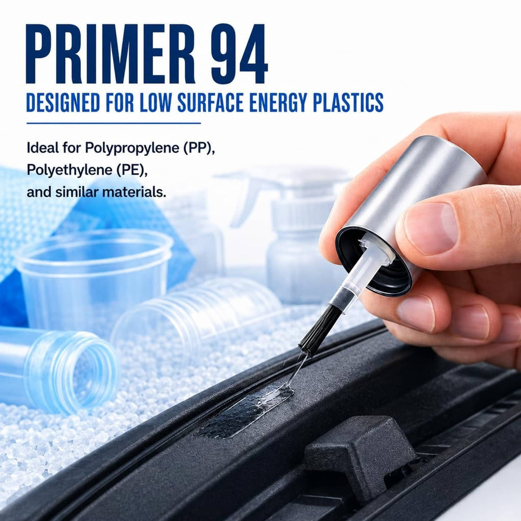 Adhesion promoter brush applicator in hand applying primer to a dark plastic strip.
