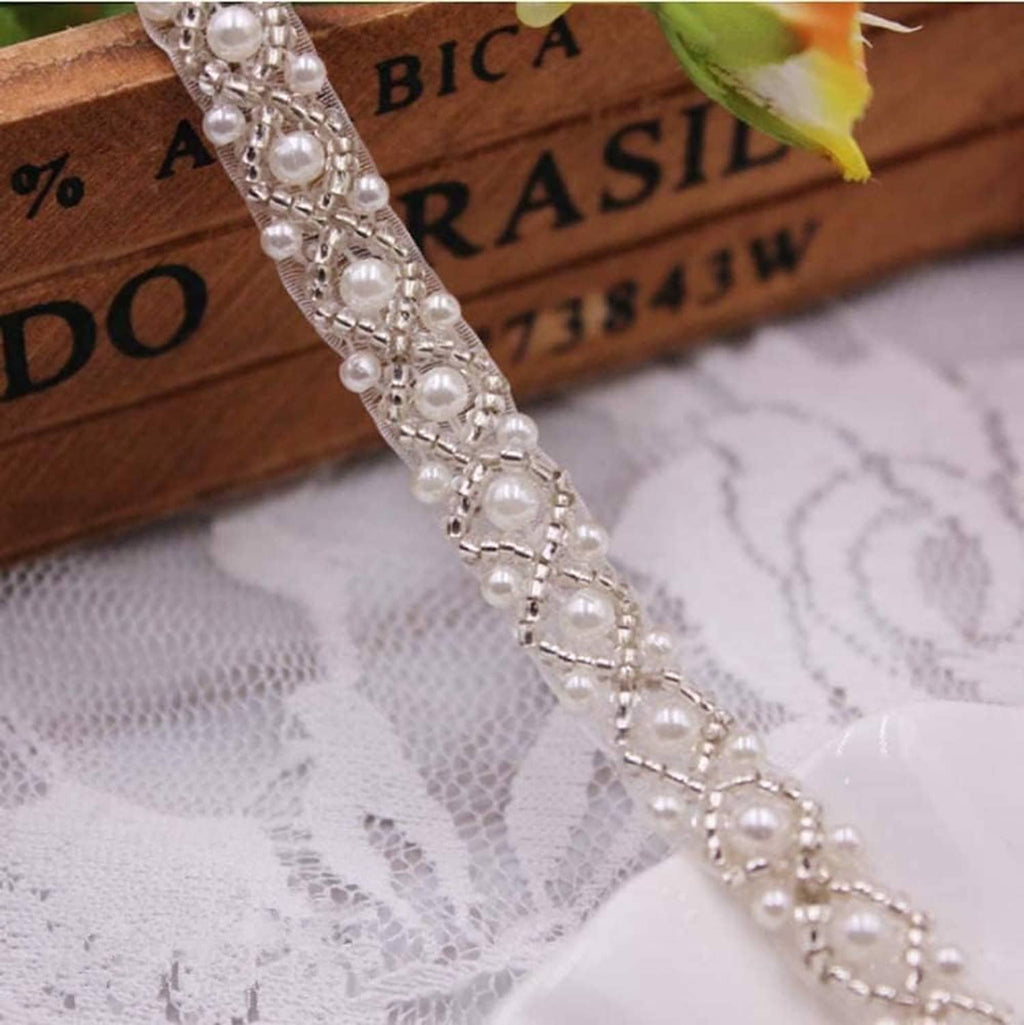 Pearl beaded lace trim ribbon with repeating white pearls and silver links