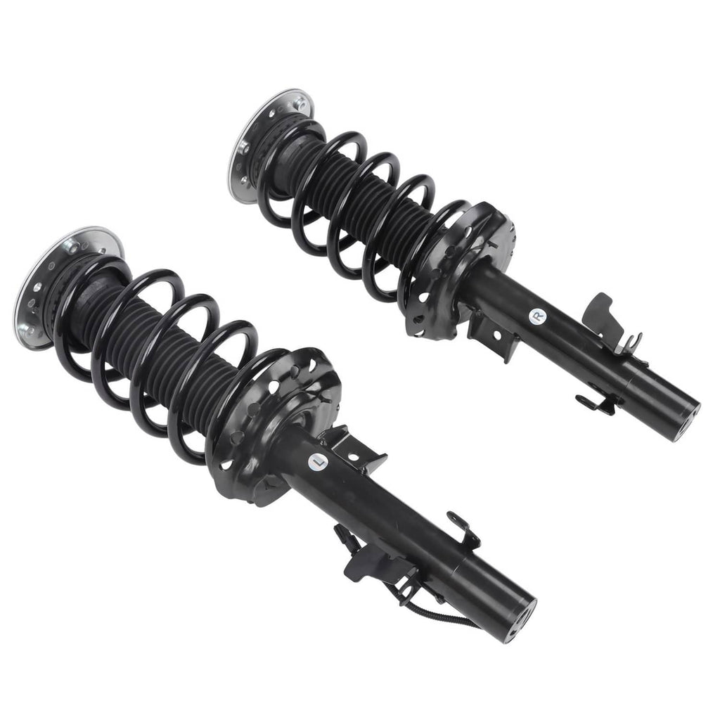 Pair of front shock struts with black coil springs and black shock tubes, side view