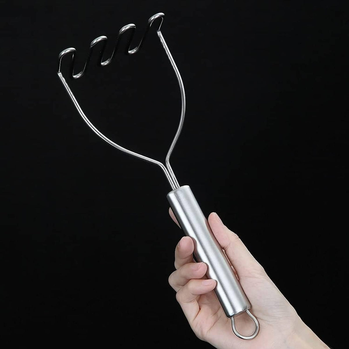 Stainless steel potato masher/ricer with oval head and curved prongs