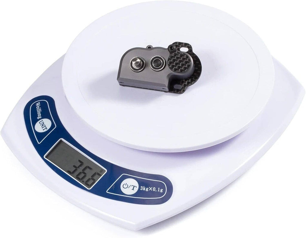RC 48P gearbox with slipper pad shown on a digital weight scale
