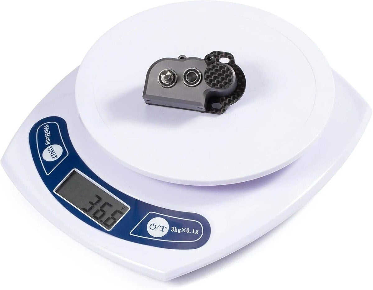 RC 48P gearbox with slipper pad shown on a digital weight scale