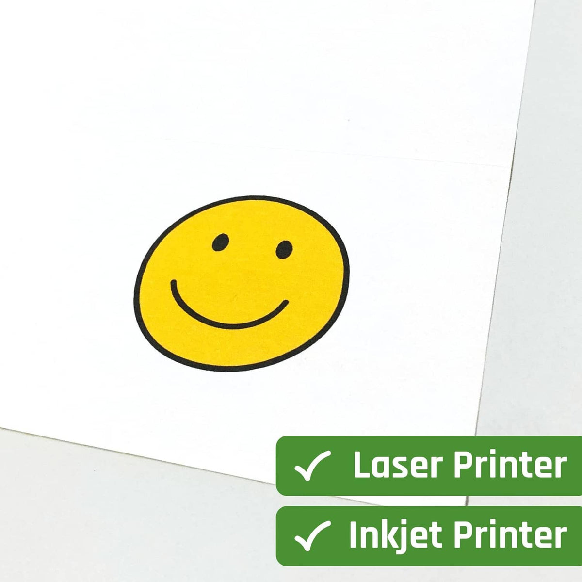 White sticker sheet with yellow smiley face sticker graphic and printer checkmarks