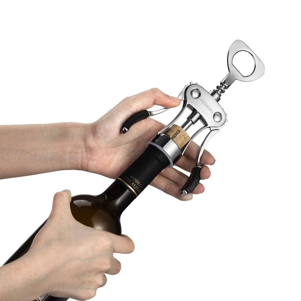 Silver wing corkscrew wine bottle opener with black handles being used by hands