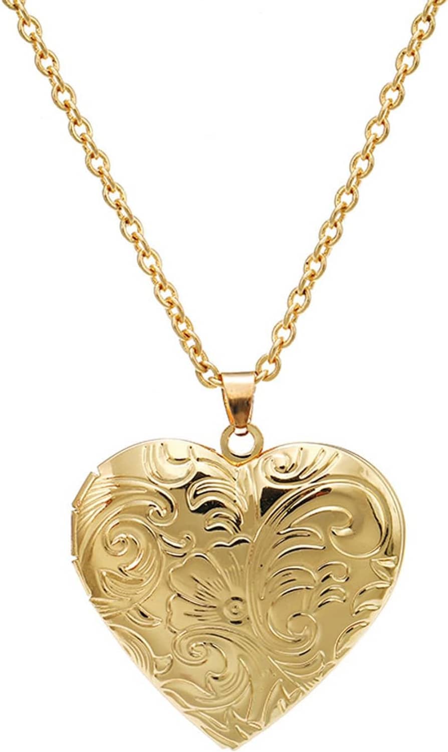 Gold heart photo locket pendant with engraved floral scrollwork on a link chain
