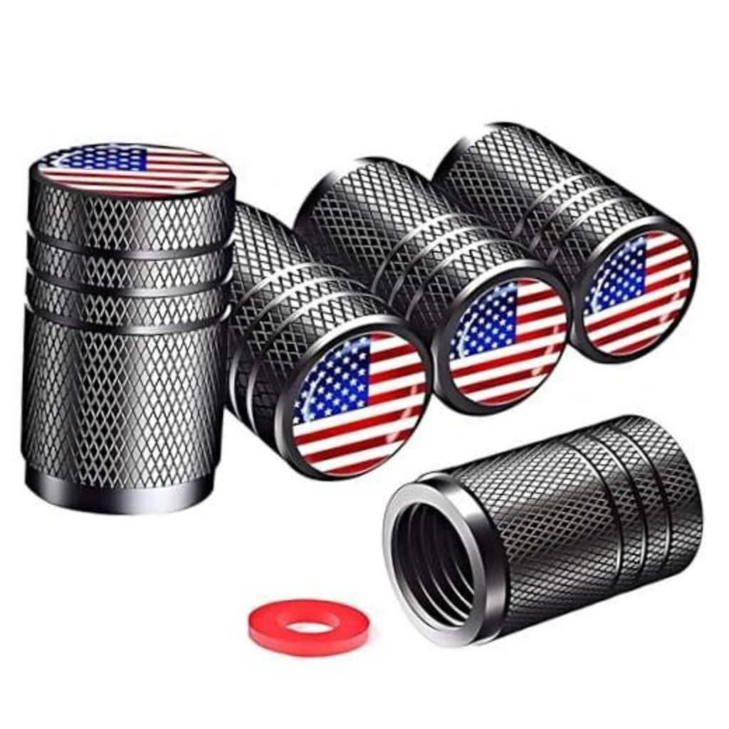 Five black knurled tire valve stem caps with American flag tops and red seals